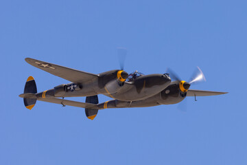 Very close view of P38 Lightning approaching  (WWII American fighter plane) 