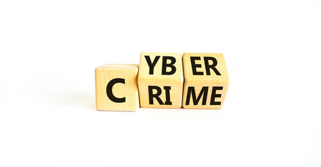 Cyber crime symbol. Concept words Cyber crime on wooden cubes. Beautiful white table white background. Business and cyber crime concept. Copy space.