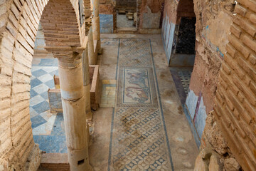 Ruins of antique terrace houses at Ephesus with views fresco painting on walls and floor mosaics,...