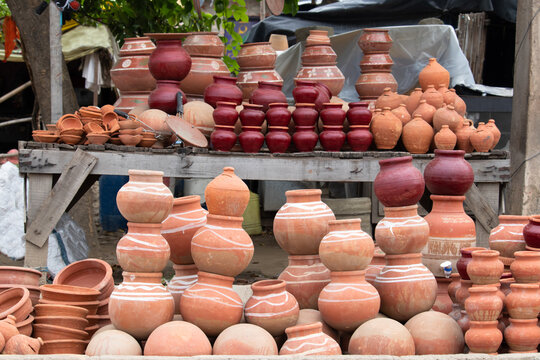 Handmade Terracotta Ceramic Clay Based Earthenware Used For Cooking Or Storing Food And During Traditional Festival Celebration In India. Piled Up Variety Of Unglazed Or Glazed Hard, Fired Ceramic