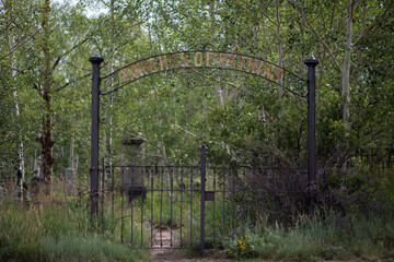Old, rusty, cemetery entrance sign. Knights of Pythias in Breckenridge, CO