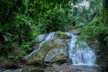 Visit a waterfall in the valley.