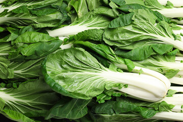 Fresh green pak choy cabbages as background, top view - obrazy, fototapety, plakaty