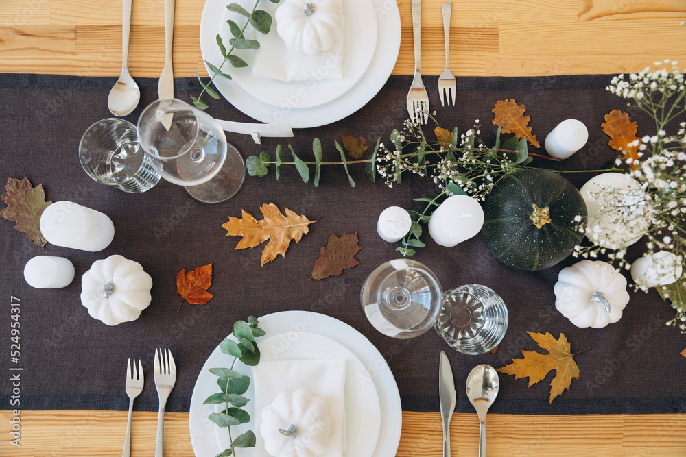 Wall mural Thanksgiving table setting, tableware and decor, decoration, family holiday. Autumn mockup, top view