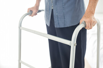 old patient walk training , stroke patient use walker, rehabilitation process