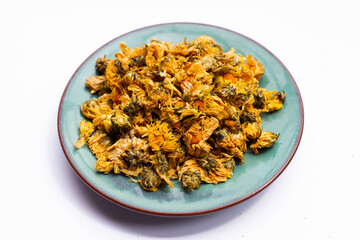 Dried chrysanthemum flower on white background.
