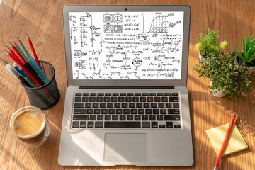 Mathematic equations and modish formula on computer screen showing concept of science and education
