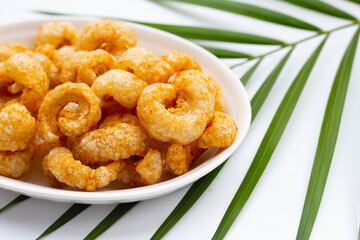 Crispy pork rinds or pork snack.