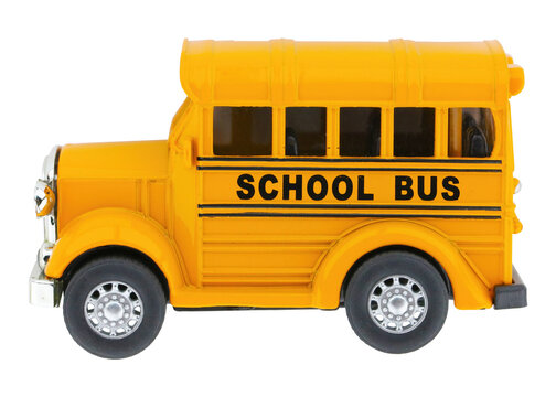 Cutout of an isolated generic yellow school bus miniature toy  with the transparent png background	