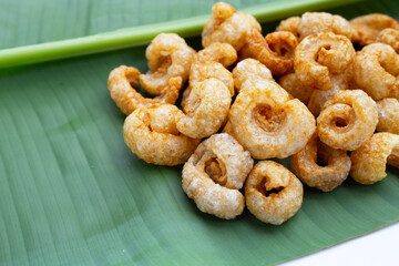 Crispy pork rinds or pork snack.