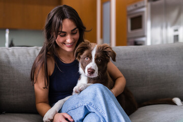 young women with pet puppy