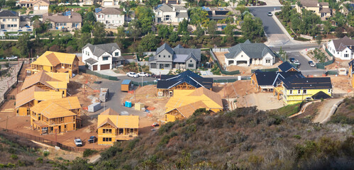 Aerial view of residential construction in various stages of development