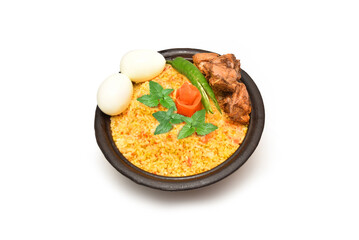 Chicken dhum biriyani using rice and spices arranged in earthen ware witheggs,  raitha and pickle on white background. Biryani is a mixed rice dish originating among the Muslims of the Indian subconti