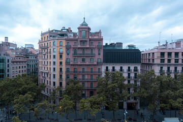 Exterior view of old architecture in central part of Barcelona, Spain. Colorful houses, buildings.