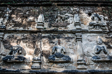 Ancient story angels on temple wall, Art on the stone about Buddha story on temple wall
