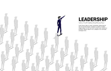 Silhouette businessman lead group of businessman to move forward. Business Concept of leadership goal and vision mission