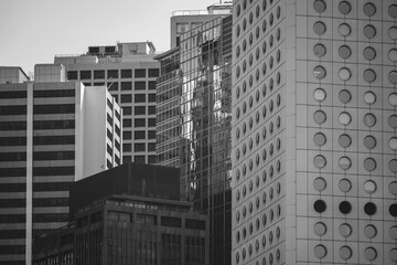 Fototapeta na wymiar Hong Kong Commercial Building Close Up; black and white color