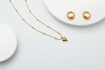 Gold jewelry on white background