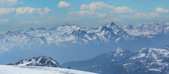 Panoramic of  Swiss Mountain against the blue sky bckground