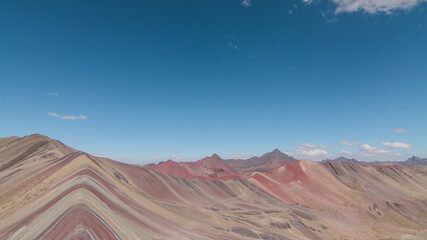 Fototapeta premium Amazing Mountainous Landscape In Peru.photography of huaraz peru, with people with hiking clothes, lakes, mountains, colors, rainbow mountain.