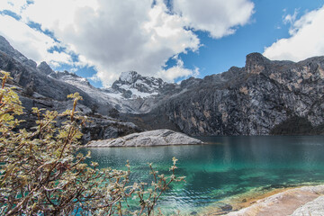 Amazing Mountainous Landscape In Peru.

photography of huaraz peru, with people with hiking clothes, lakes, mountains, colors, rainbow mountain.