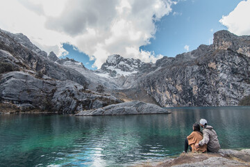 Amazing Mountainous Landscape In Peru.

photography of huaraz peru, with people with hiking clothes, lakes, mountains, colors, rainbow mountain.