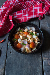 Popular north Indian dish paneer or cottage cheese with veggies saute in a bowl. Top view, selective focus.