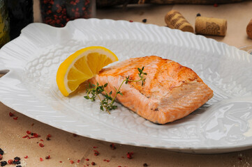 grilled salmon steak on a white plate
