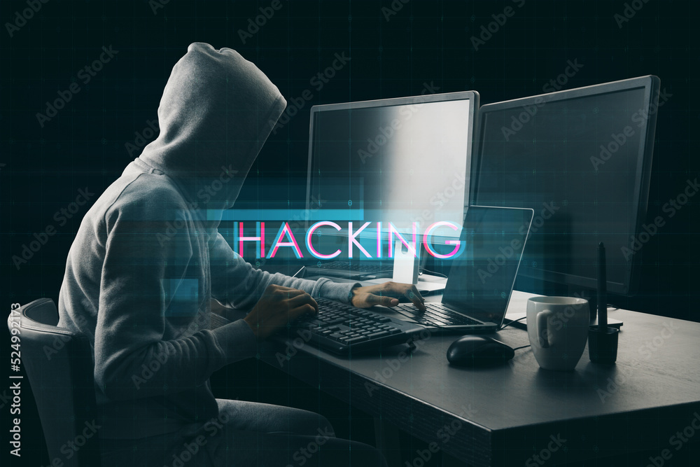 Poster Side view of hacker at desktop using computers with abstract creative digital text hologram on dark background. Hacking, technology and ai concept.