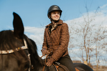 Jockey woman riding her horse during equestrian practice