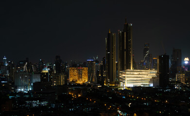 Night view of Bangkok, Thailand, filled with many tall buildings gives a lively city feel