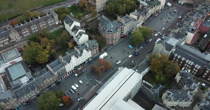 Rare drone shot of Edinburgh's grass market and old town, captured in the early morning at sunrise.