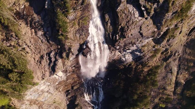 aerial drone footage pushing in and orbiting counterclockwise at Fallbach in Grindelwald