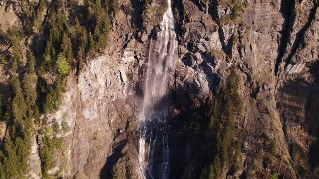 aerial drone footage pushing out at scenic Fallbach in Grindelwald, Switzerland