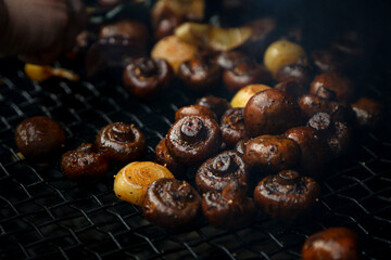 Champignons cooked on the grill. Close up