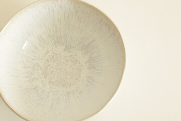 top view of empty white and blue bowl