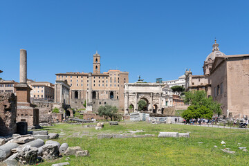Fototapeta na wymiar View of the Foro Romano with the Tabularium and Arco di Settimio Severo in Rome
