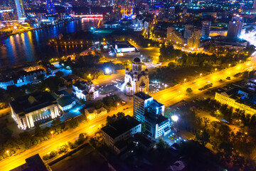 Fototapeta na wymiar Aerial view of the night modern city. Church of Christ the Savior. Bright lights of the night streets. Ekaterinburg. Russia