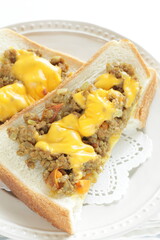 Cheese and curry minced pork on toast