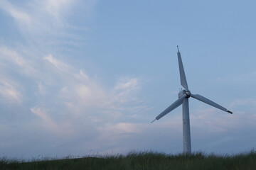 old broken abandoned wind turbine on the beach