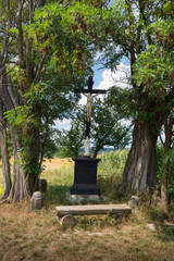 Old cross by the way. A place to rest and meditate. Ostrov village, South Moravia, Czech Republic.