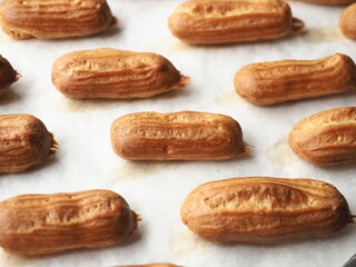 Baked homemade small eclairs