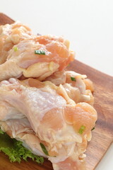 Seasoning Chicken drumsticks for barbecue cooking