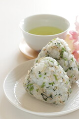 Japanese food, dried small sardines fish and green leaves vegetable mixed rice ball