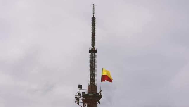 Bangalore, India 22nd August 2022: The Karnataka flag placed on a famous Bangalore Tv Tower monument in Jayamahal, Bengaluru. Popularly used all over Karnataka to represent state and Kannada.