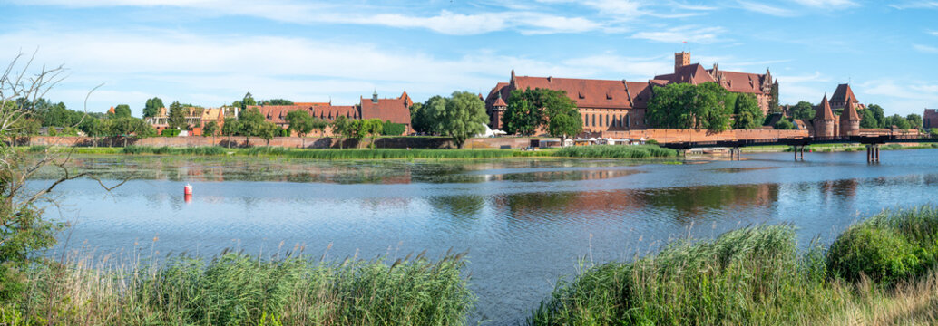 The largest brick castle in the world - Malbork Castle on the Nogat River, Poland