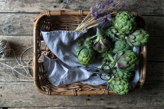 Fresh artichokes placed in basket