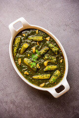 palak baby corn sabzi also known as spinach makai curry served with rice or roti, Indian food