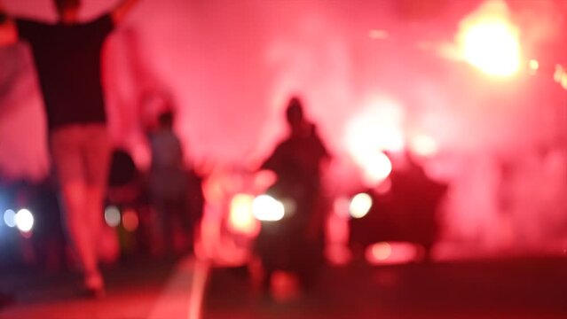 Red Star Football fans with torches and flags marching on streets and celebrating league title win in Belgrade, Serbia 22.05.2022