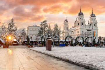 Christmas market and decorations tree in center of Iasi town at sunset, Romania